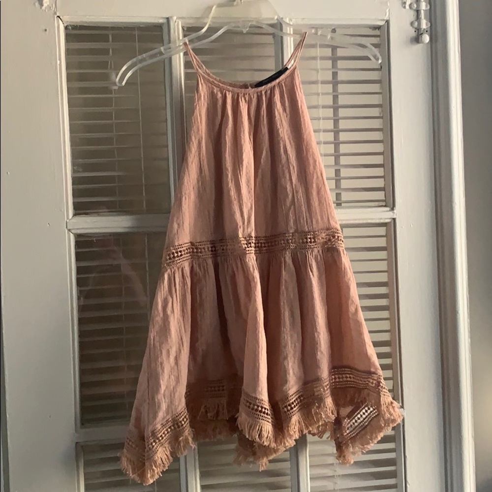 Light tan/pinkish tank top